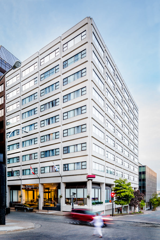 The outside of the The Hollis Halifax - a DoubleTree Suites by Hilton Hotel building.