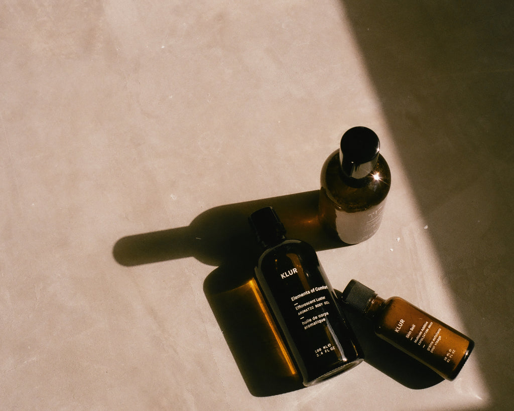 Three Klur skincare products on a counter. 