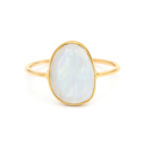 The Selena Slice Ring in Moonstone from Leah Alexandra with a 14-karat-gold vermeil ring and a light white-blue gemstone.