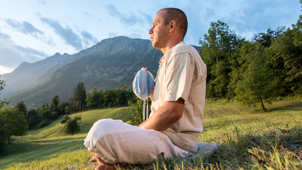 man meditating mantras