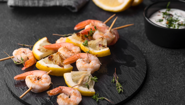 Yummy BBQ'd shrimp on skewers, brushed with garlic butter. A simple and delicious recipe from Landmann UK.