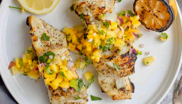 BBQ Grilled halibut with mango salad recipe - A delicious, fresh treat ideal for the BBQ. Great fish recipe for the grill.