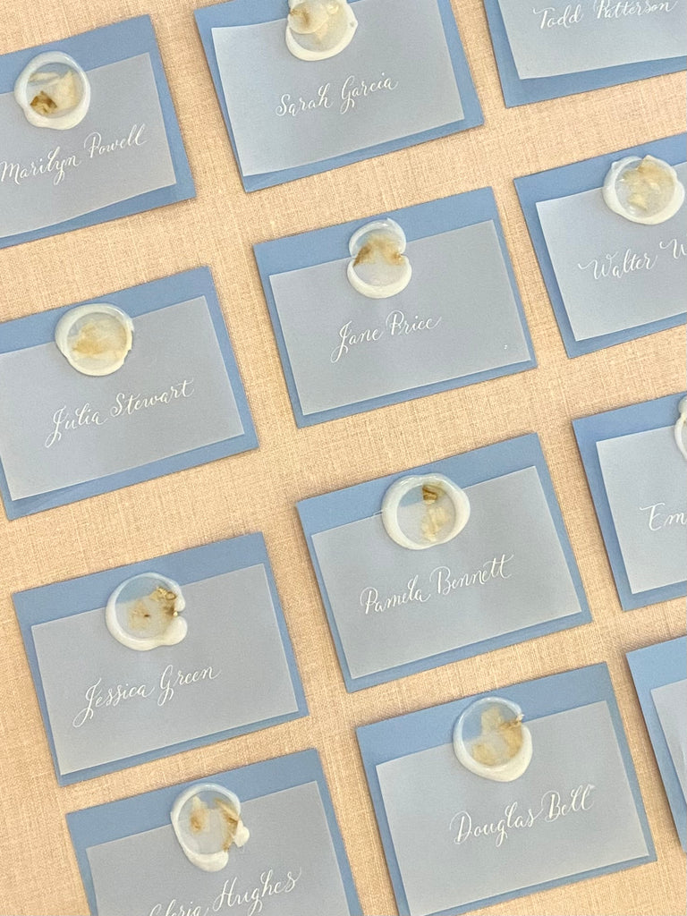 Allison Costlow Connecticut, New York City and Westchester Calligrapher & Engraver blue vellum place card white rose wax seal