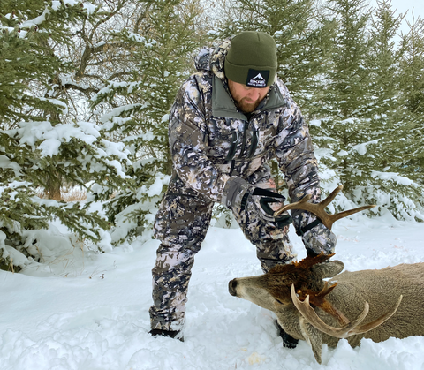 Successful whitetail hunt in snow