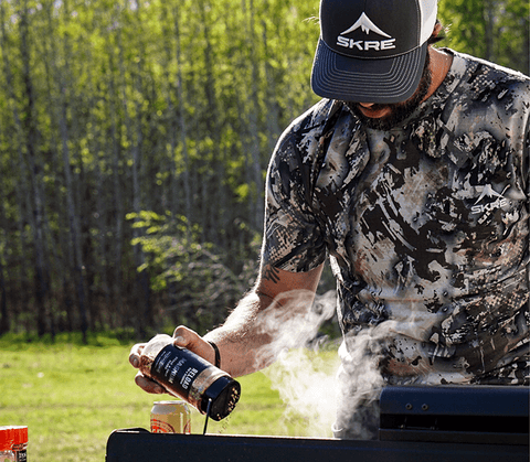 Man cooking in base layer top