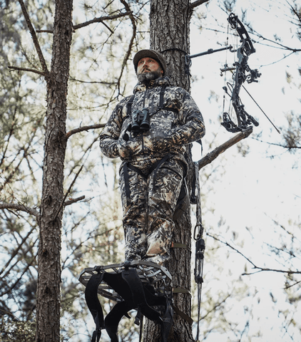 Whitetail hunter in a tree stand