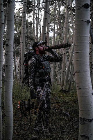 Man using a bugle to call elk