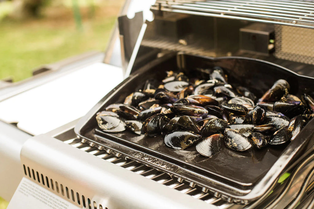 Muscheln auf einer Plancha