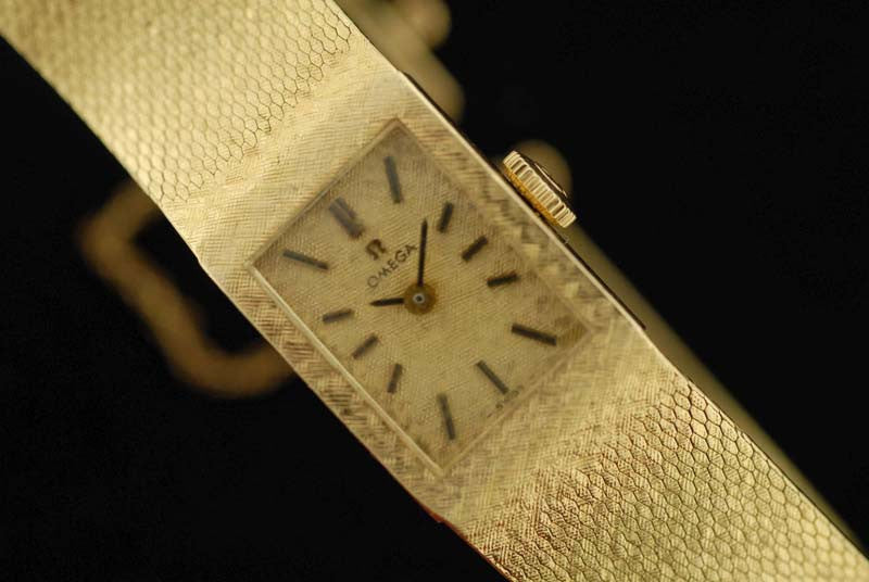 omega gold watch 1977