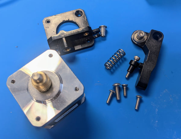 A fully disassembled extruder