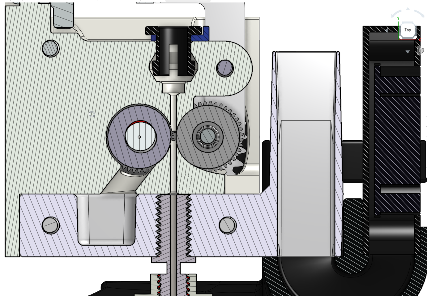 A cross section view showing the filament extrusion path through the OmniaDrop Extruder.
