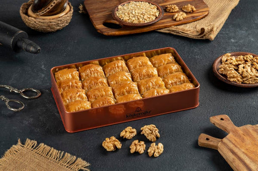 https://cdn.shopify.com/s/files/1/0603/2025/2142/products/koskeroglu-antep-baklava-with-walnut-in-gift-metal-box-522014_512x341.jpg?v=1696369229