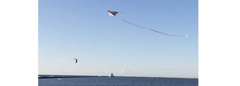  Brenda L Dann Lighthouse with kites flying presented by H Lee White Maritime Museum near Oswego NY