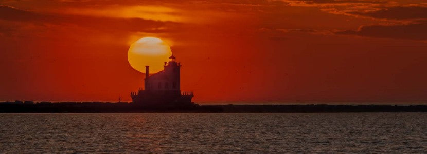 Dennis Cooper Sunset Far Away Lighthouse presented by H Lee White Maritime Museum near Oswego NY