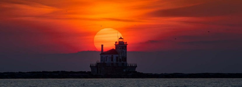 Dennis Cooper Sunset Lighthouse presented by H Lee White Maritime Museum near Oswego NY