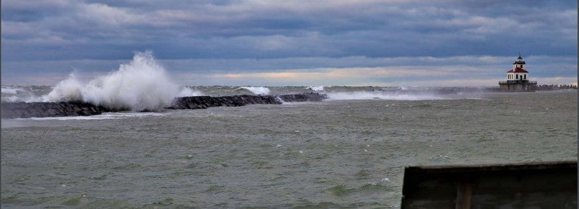 Duane Thomas side view of lighthouse presented by H Lee White Maritime Museum near Oswego NY