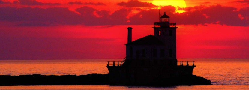 Michael Montgomery sunset fire lighthouse presented by H Lee White Maritime Museum near Oswego NY