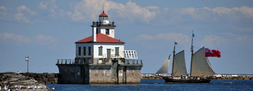  Ray Grella Sailboat with Lighthouse presented by H Lee White Maritime Museum near Oswego NY