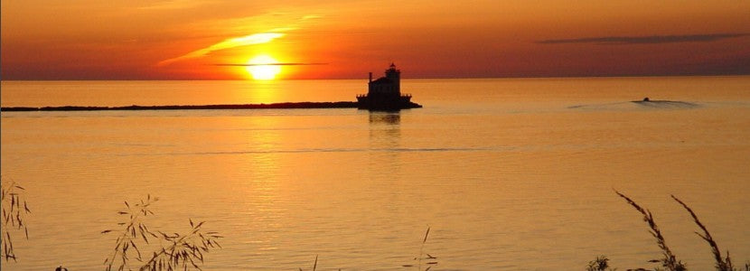  Robert Jones Lighthouse at Sunset presented by H Lee White Maritime Museum near Oswego NY