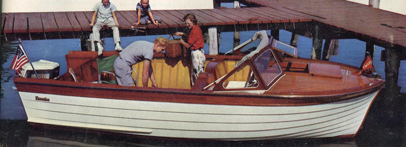 Wooden Boats presented by h lee white maritime museum near oswego ny image of family on a boat