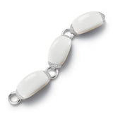 Boat Link Bracelet in White Ceramic and Diamond Set in 18 Karat White Gold. Signed Seaman Schepps.