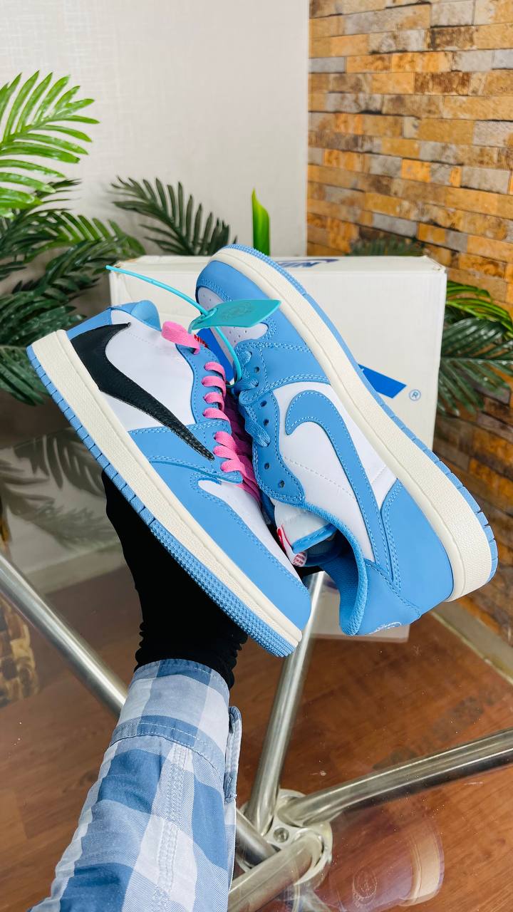 Travis Scott X Nike Air Jordan 1 Low "Unc Blue" – Luxury Junction