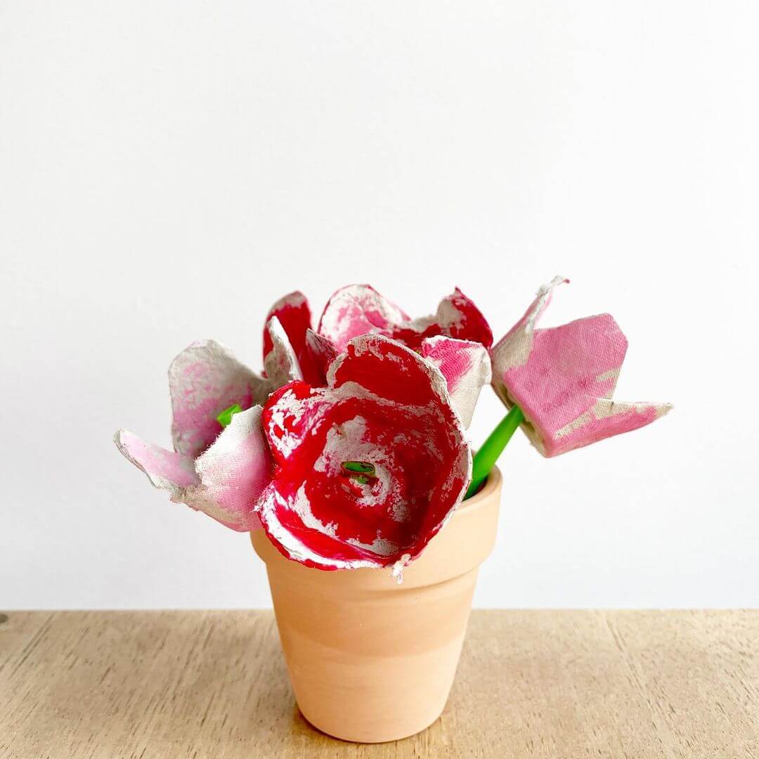 Vase with cardboard roses made from egg cartons.