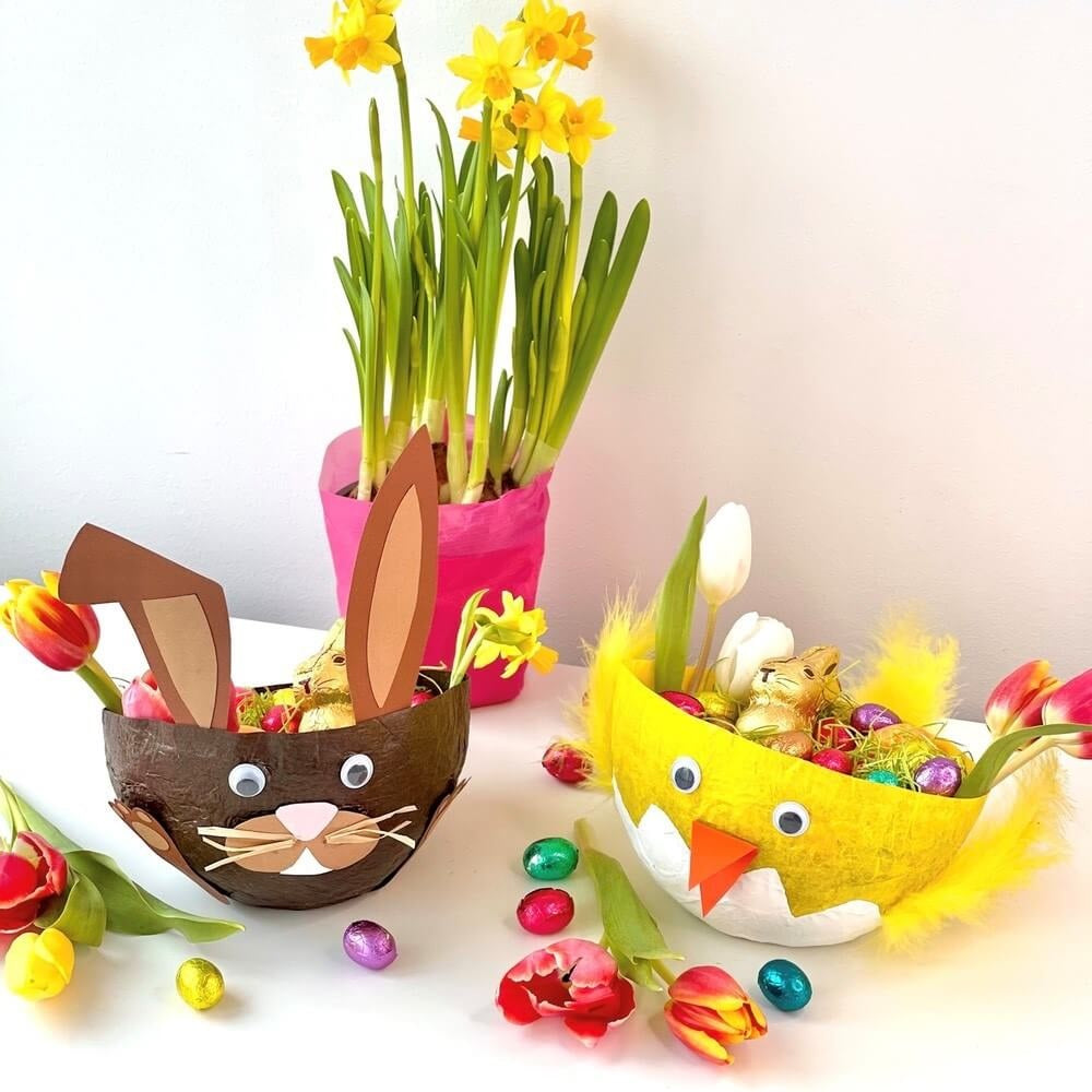 Two large rabbit and chicken paper mache baskets.