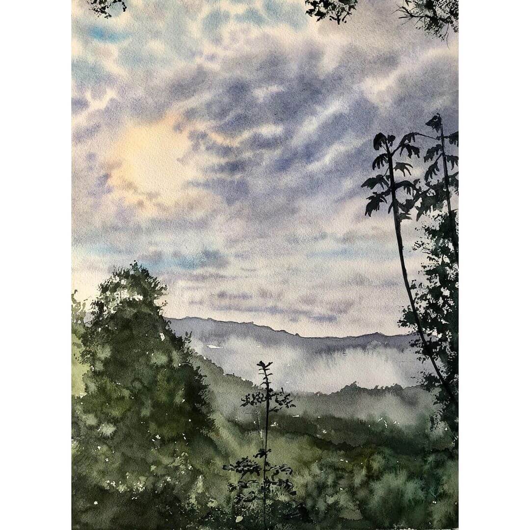 A cloudy morning in a forest painted in watercolour on paper.