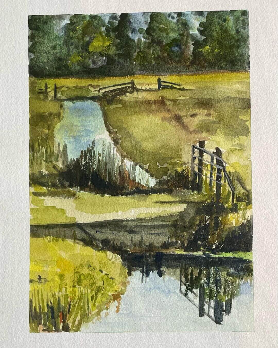 A country meadow with a creek flowing in the middle painted with watercolours.