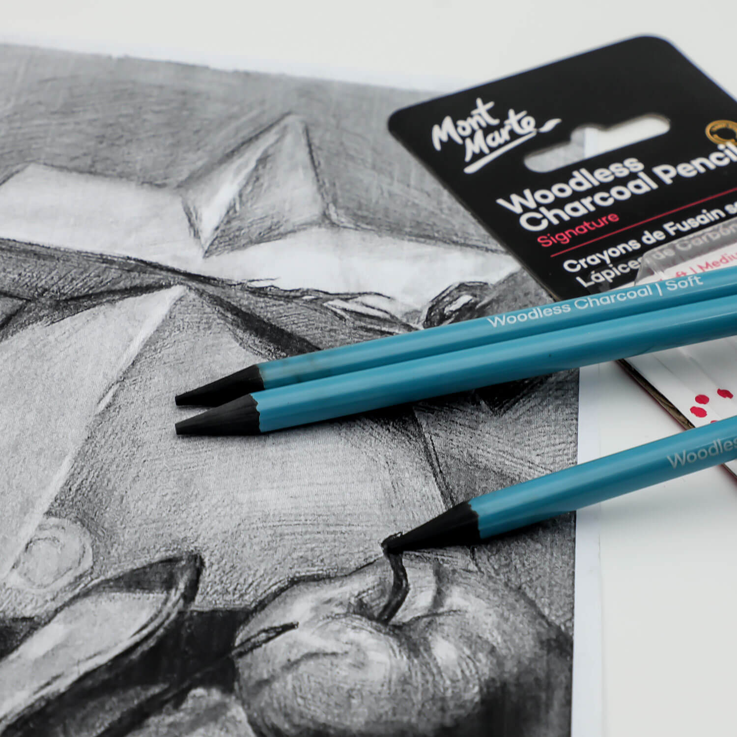 2. Woodless Charcoal Pencils with a blue laqueur coating