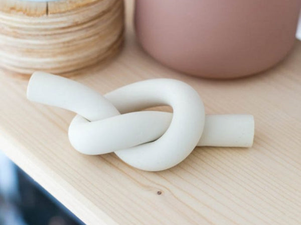 Air dry clay knot sculpture.
