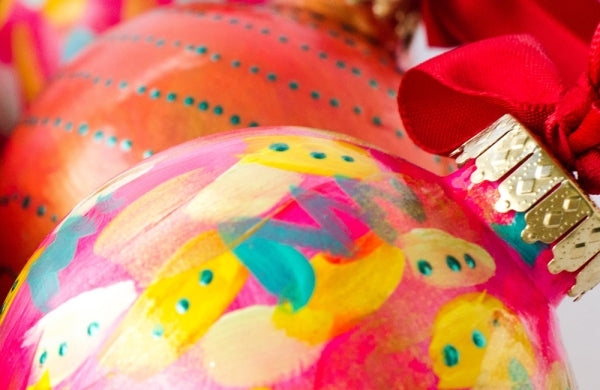 Pink patterned Christmas baubles.