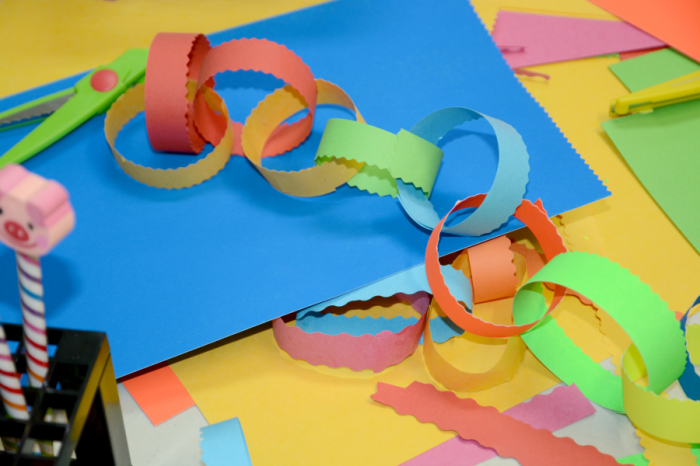 Bright coloured paper used to create a paper chain.