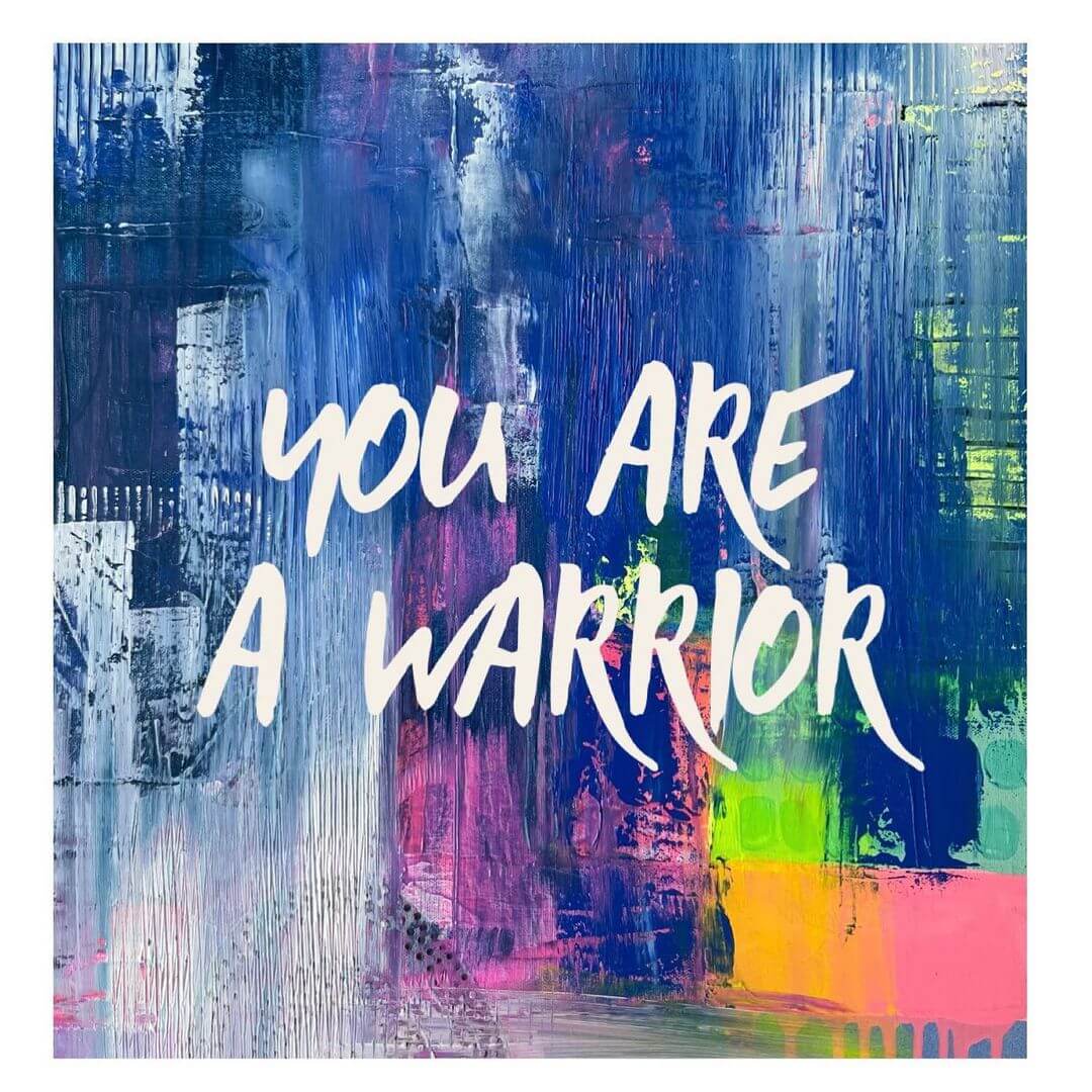 Abstract blue painting with 'you are a warrior' typography over the top.