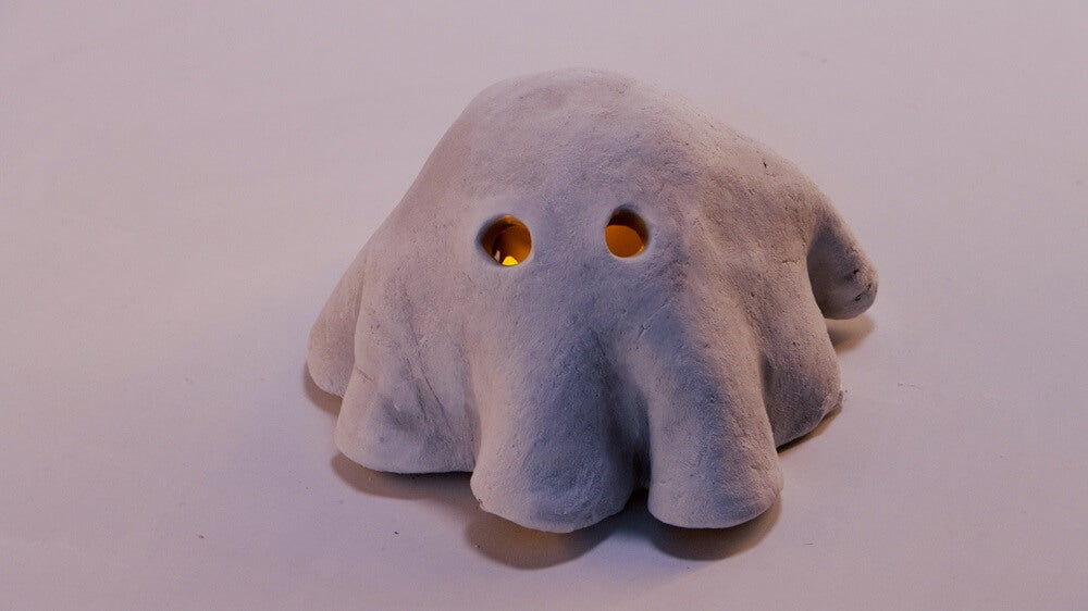 Ghost made from air dry clay with LED light inside.