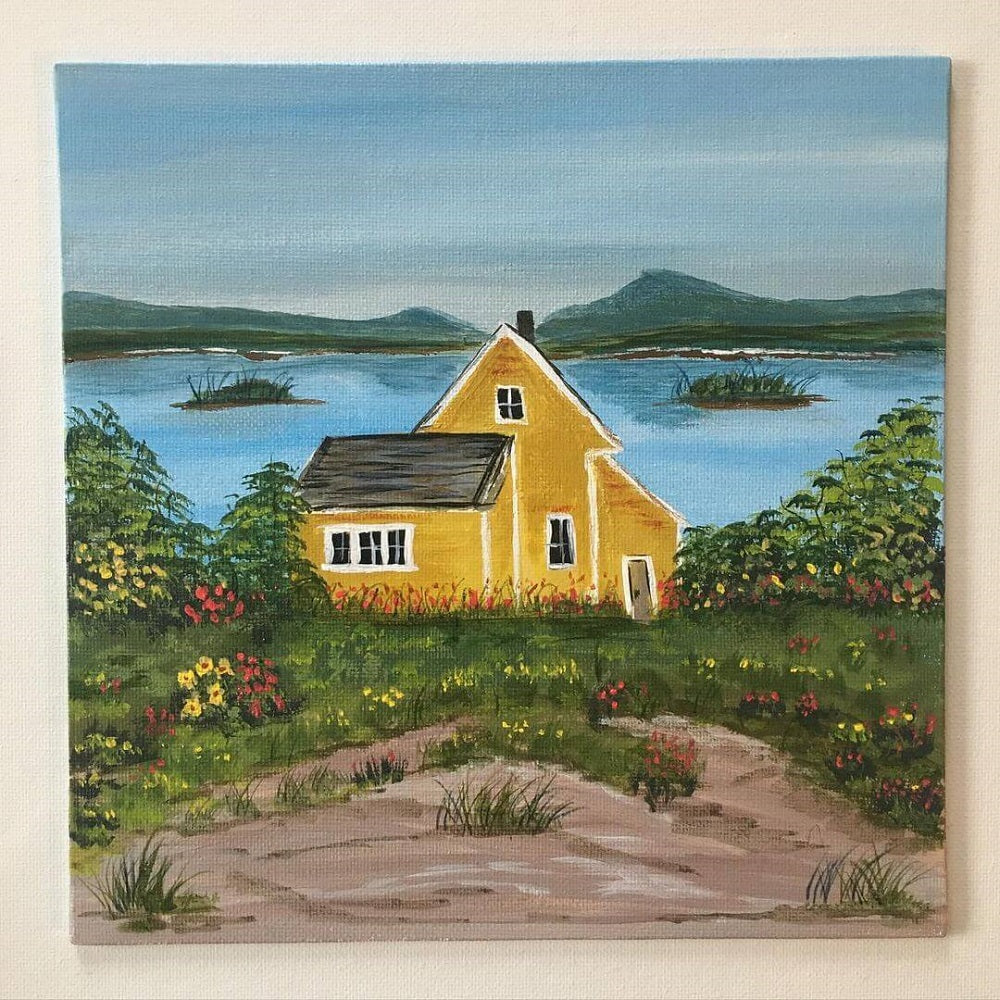 Painting of an old cottage style house near a lake painted on canvas by Tammatha Cooper.