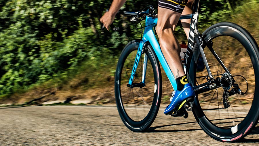 Cyclist with PowerTap power meter on bike