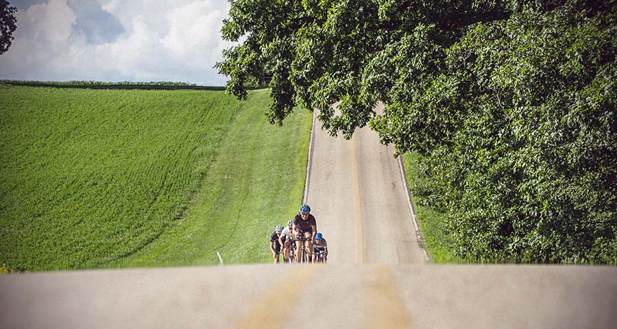 Group of cyclists training on a hill with power meters