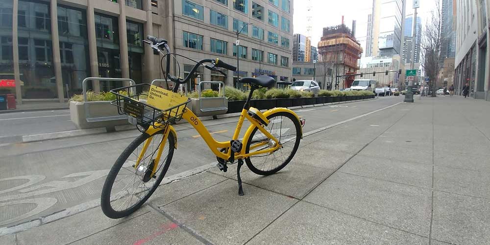 Ofo’s dockless bike sport a lemon-inspired hue sits along Seattle’s outstanding 2nd avenue bike lane