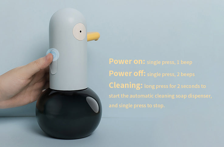 Interactive Duck Soap Dispenser showcasing easy power and cleaning functions