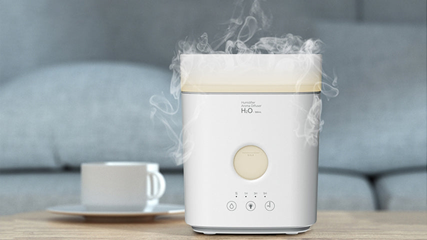 Puffing Humidifier on a desk, featuring a safe switch with automatic protection and a wide, dense mist output