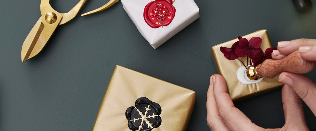 Christmas gift wrapping with wax seals