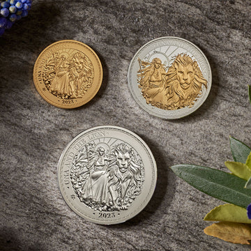 2023-una-and-the-lion-£5-gold-£1-silver-and-plated-silver-lifestyle-flat.jpg__PID:11d7b57b-b49b-4ae2-9aa3-004152241f61