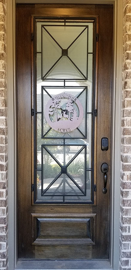 15 inch metal sign in copper color hanging on front door for scale