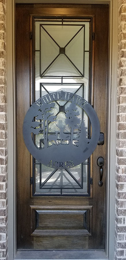 30 inch metal sign in black color hanging on front door for scale