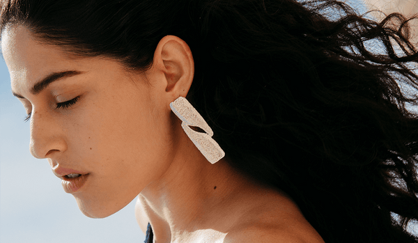 girl wearing statement earring