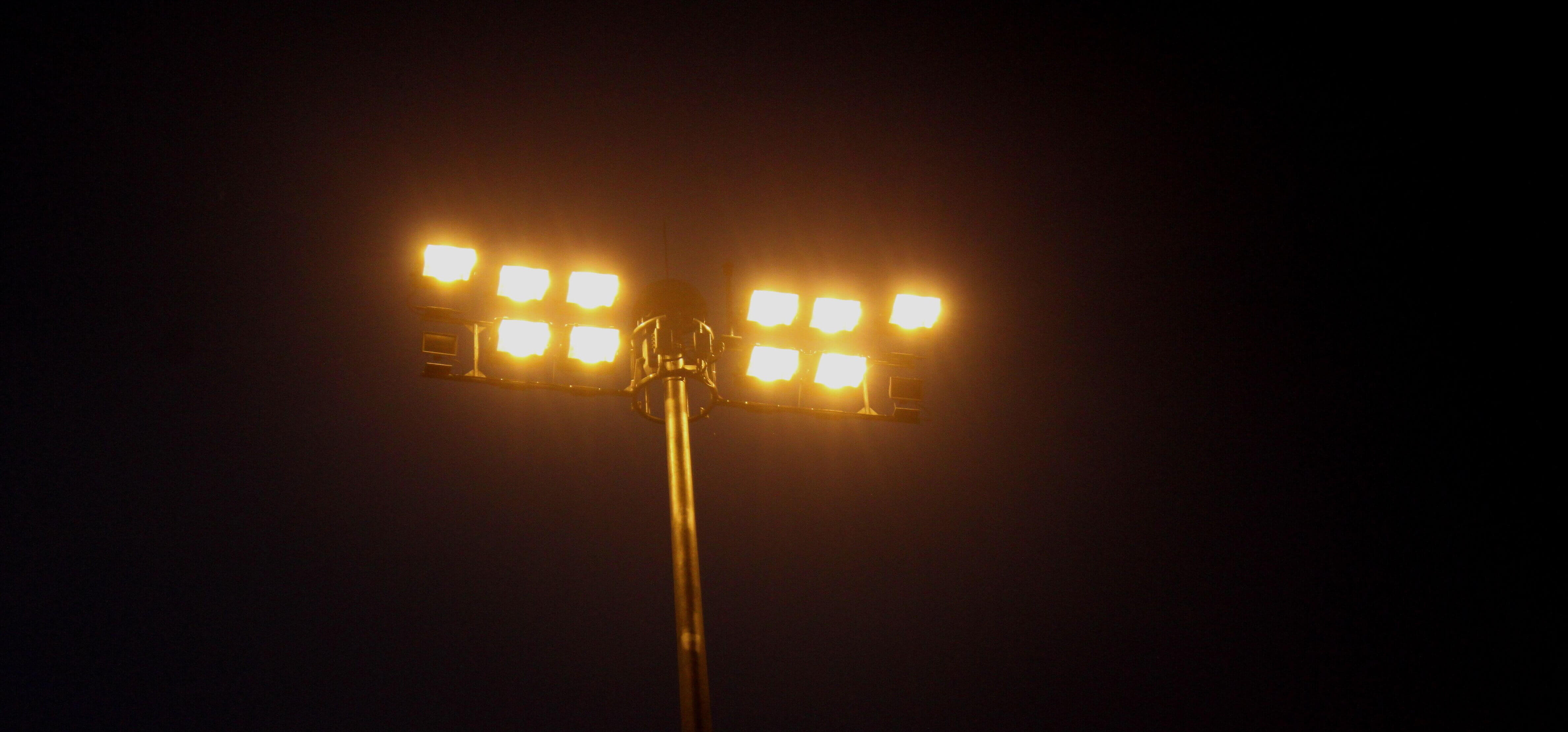 A warm bulb LED flood light at night.