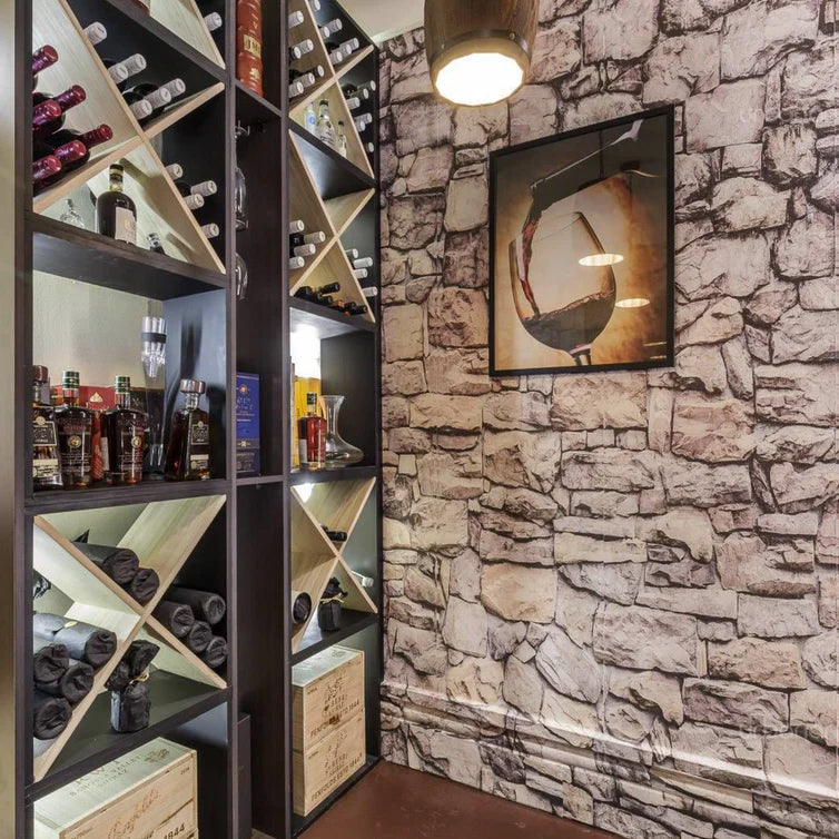 A cellar with wine bottle resting inside cube wine racks