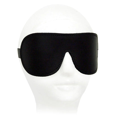 a black blindfold on a white mannequin face